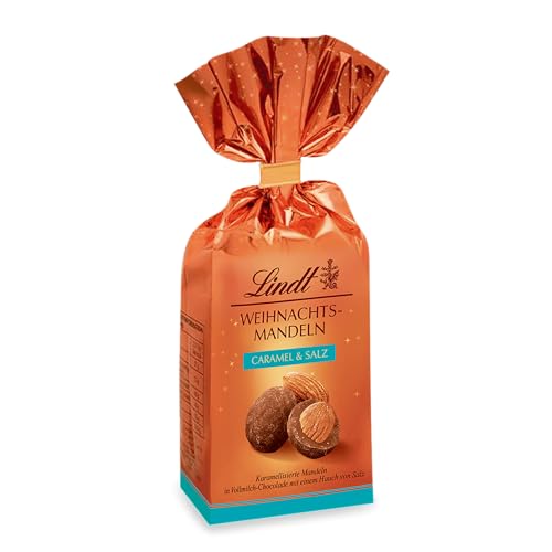 Lindt Schokolade Weihnachts-Mandeln Caramel & Salz | 100 g Beutel | Mandeln in Vollmilch Schokolade mit einem Hauch von Salz sowie Zimt und Koriander | Schokoladen-Geschenk zu Weihnachten